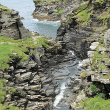 Rocky Valley where the stream reaches the sea